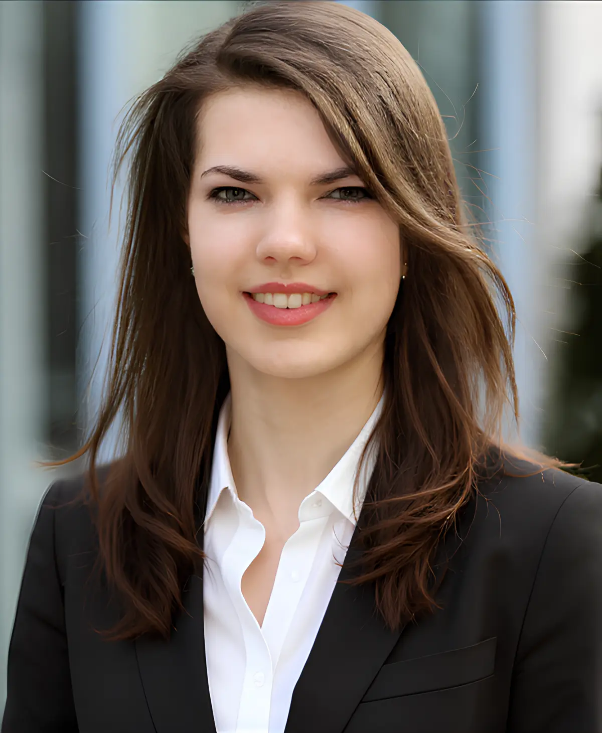 Bianca Probst, a certified holistic wellness coach based in Germany, pictured with a warm, friendly smile.